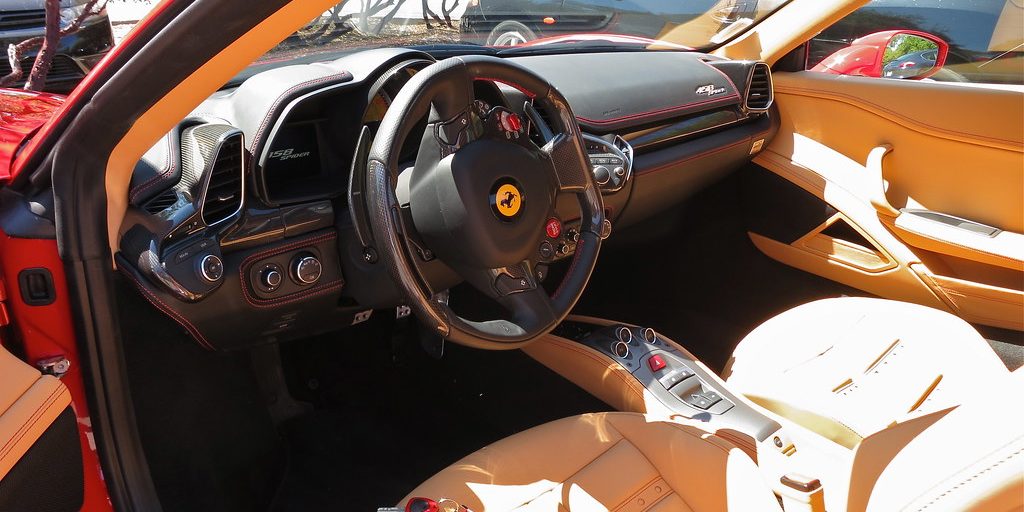 The driver's seat and steering wheel of a car