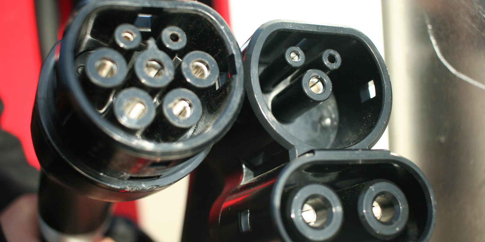 Electric vehicle charging connectors