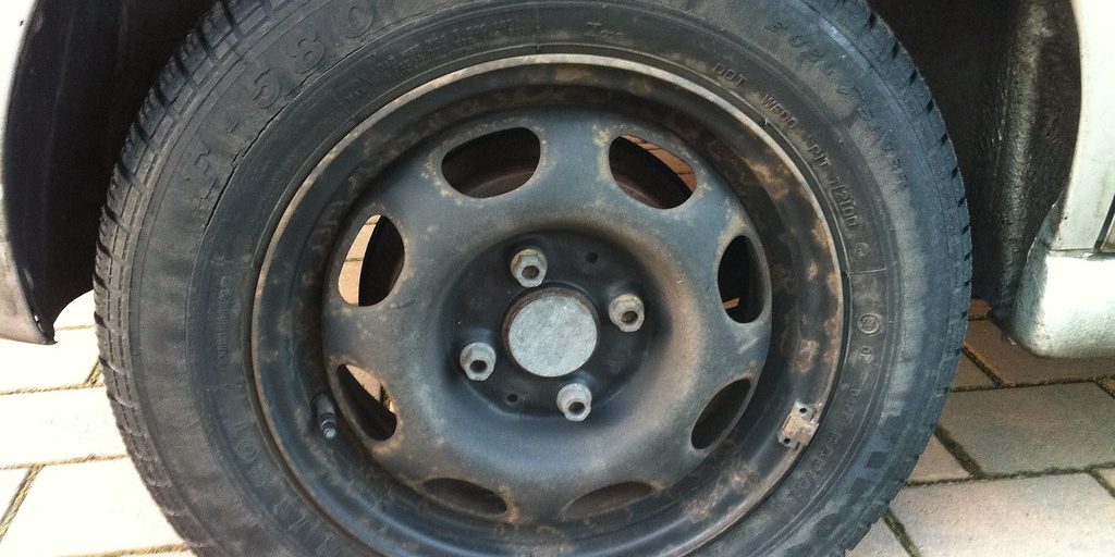 A close view of a car wheel and tyre
